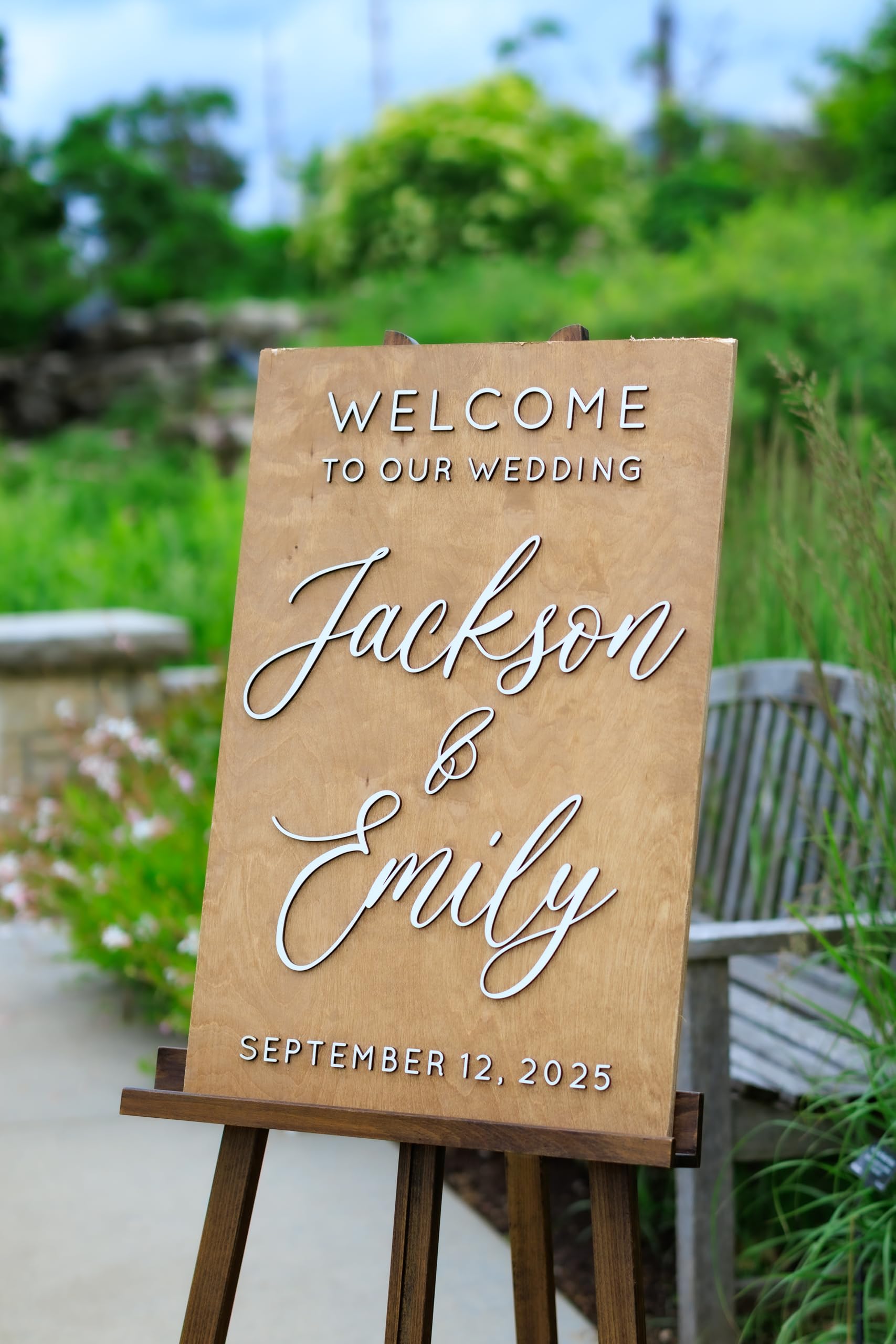 Raised lettering detail on birch wood wedding sign