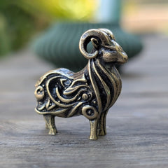 Ram figurine ornate patterns on body