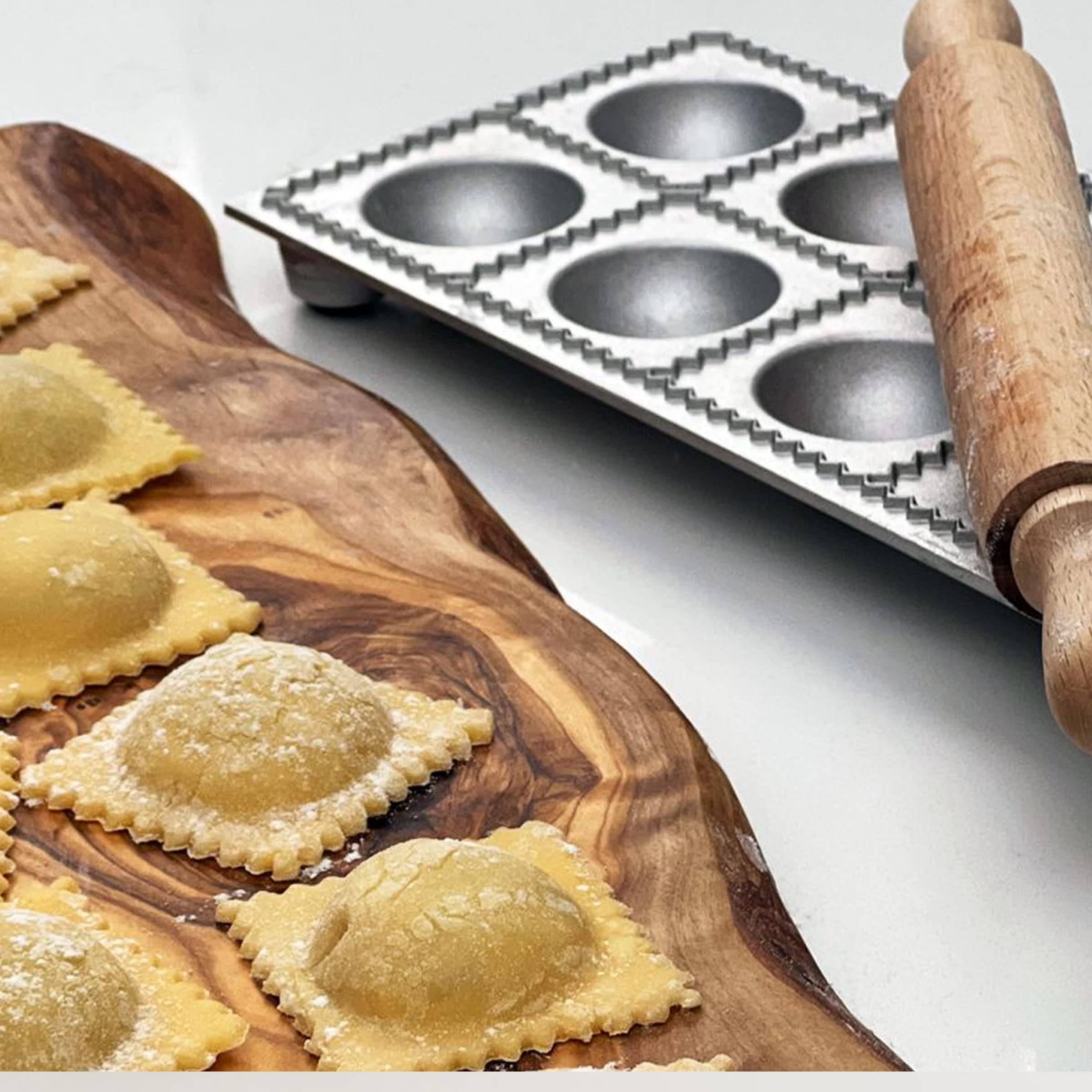 12 piece round ravioli mold ready for filling