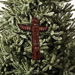 Cedar ornament designed and engraved in Texas USA