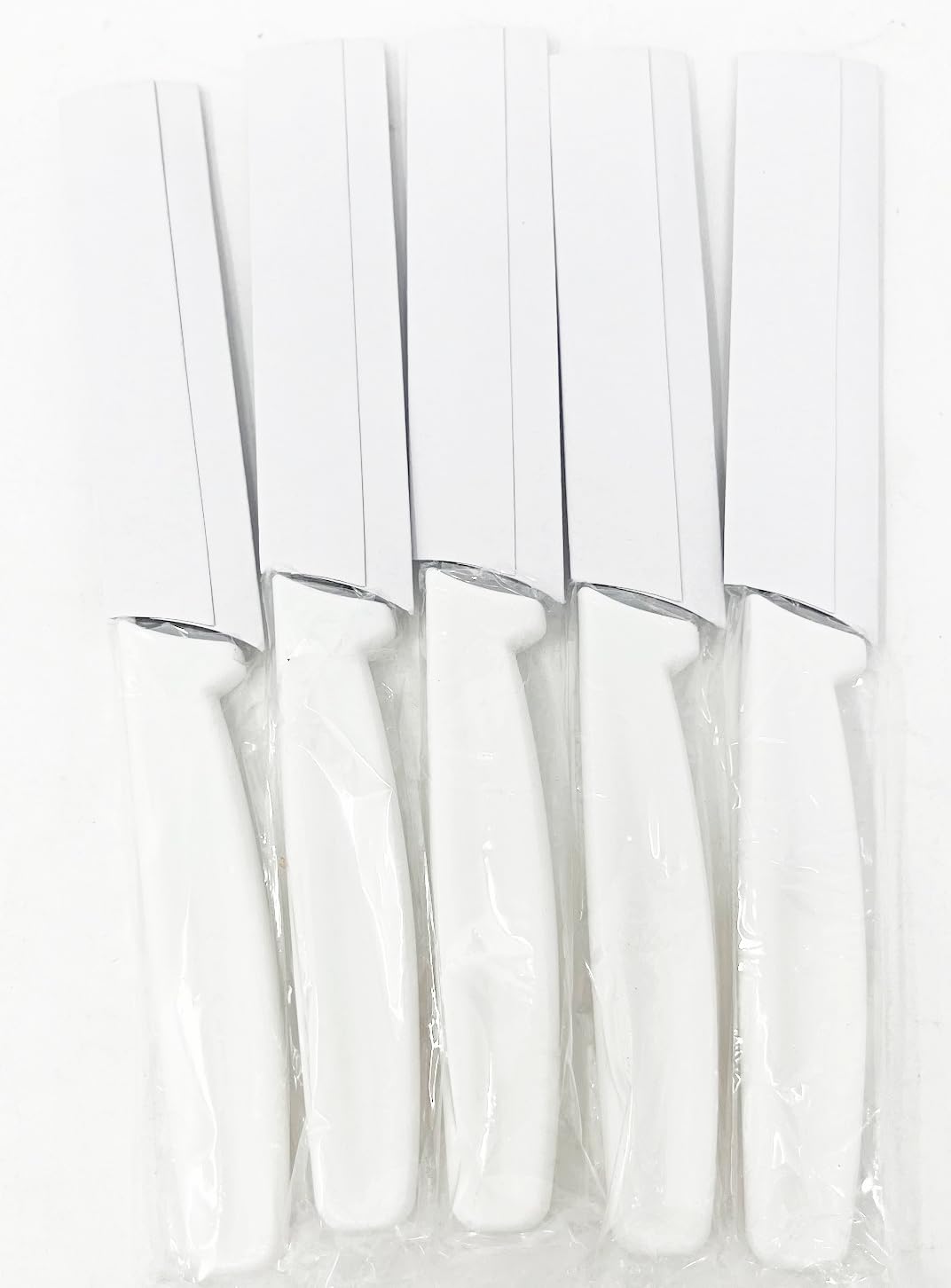 Razor sharp four inch paring knife with white handle from a five pack