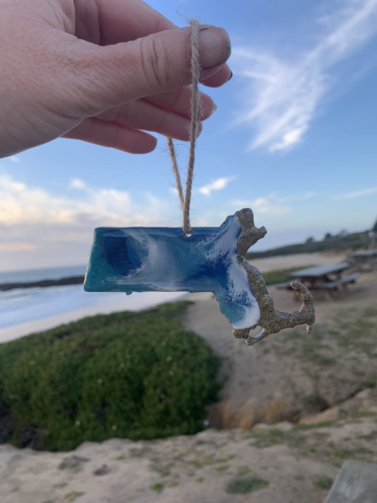 Resin art ornament captures bubbles and ocean waves