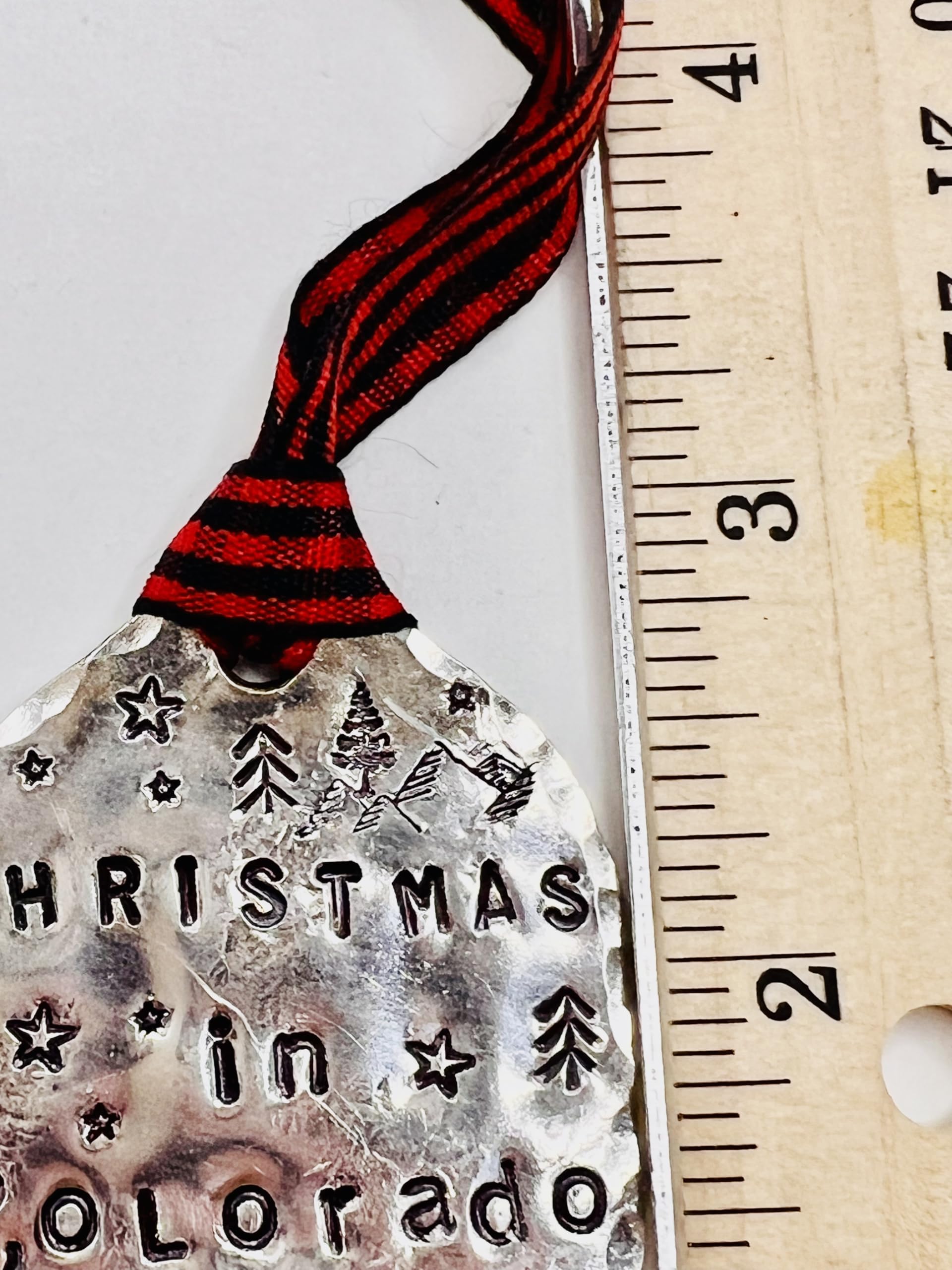 Red and black buffalo check ribbon accent on ornament