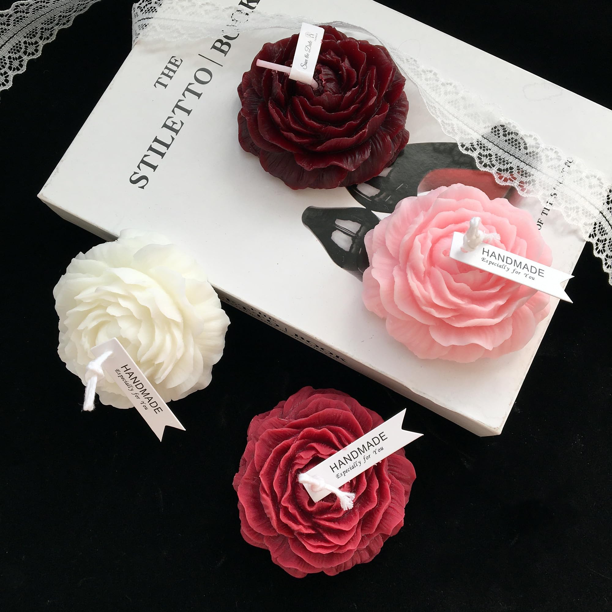 Red pink white peony candles for intimate ambiance