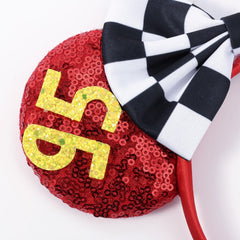 One size fits all UNSPAZ mouse ears headband worn by a model