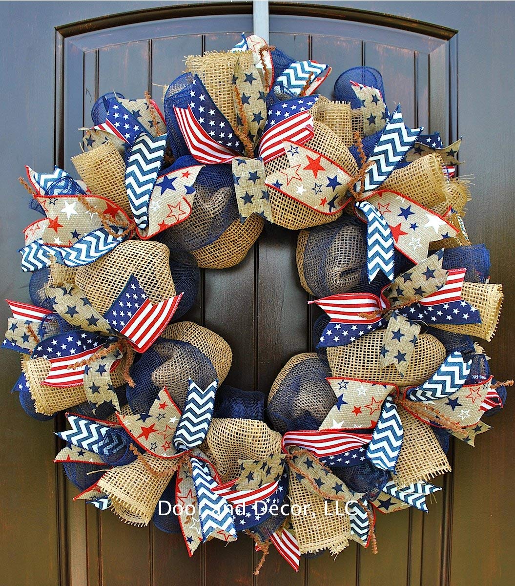 Close up of red white blue ribbons on mesh wreath