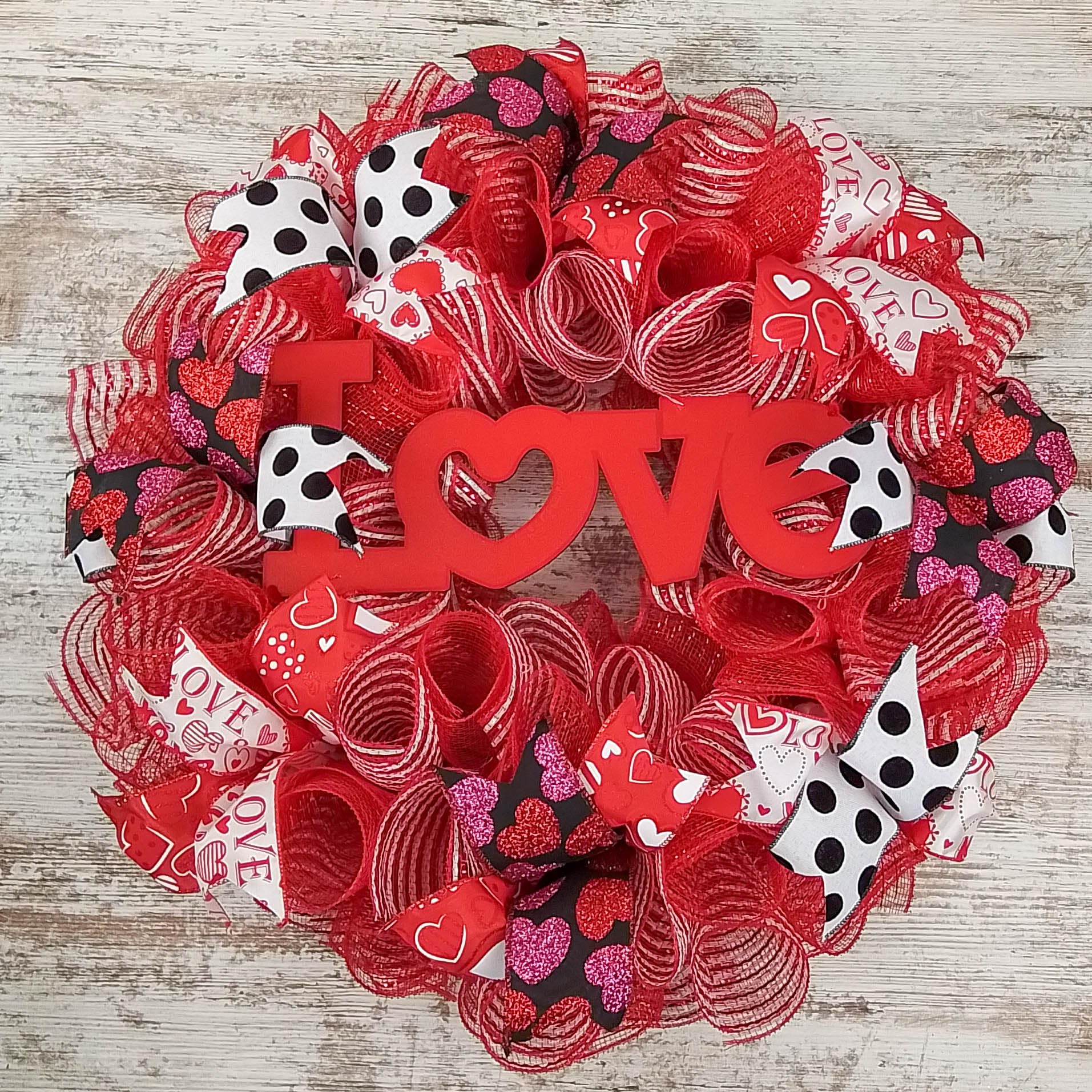 Removable Love sign centerpiece on wreath