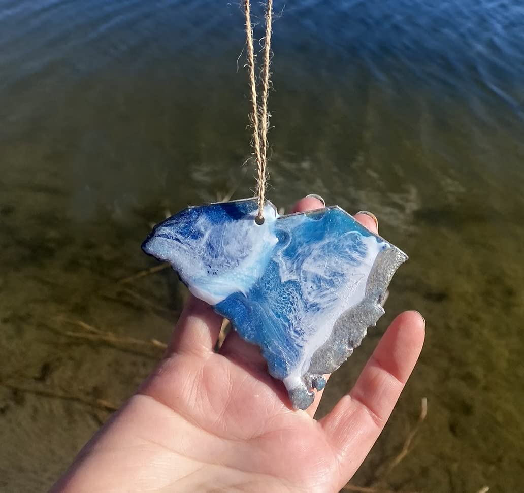 Resin art ornament showing ocean waves and sand detail