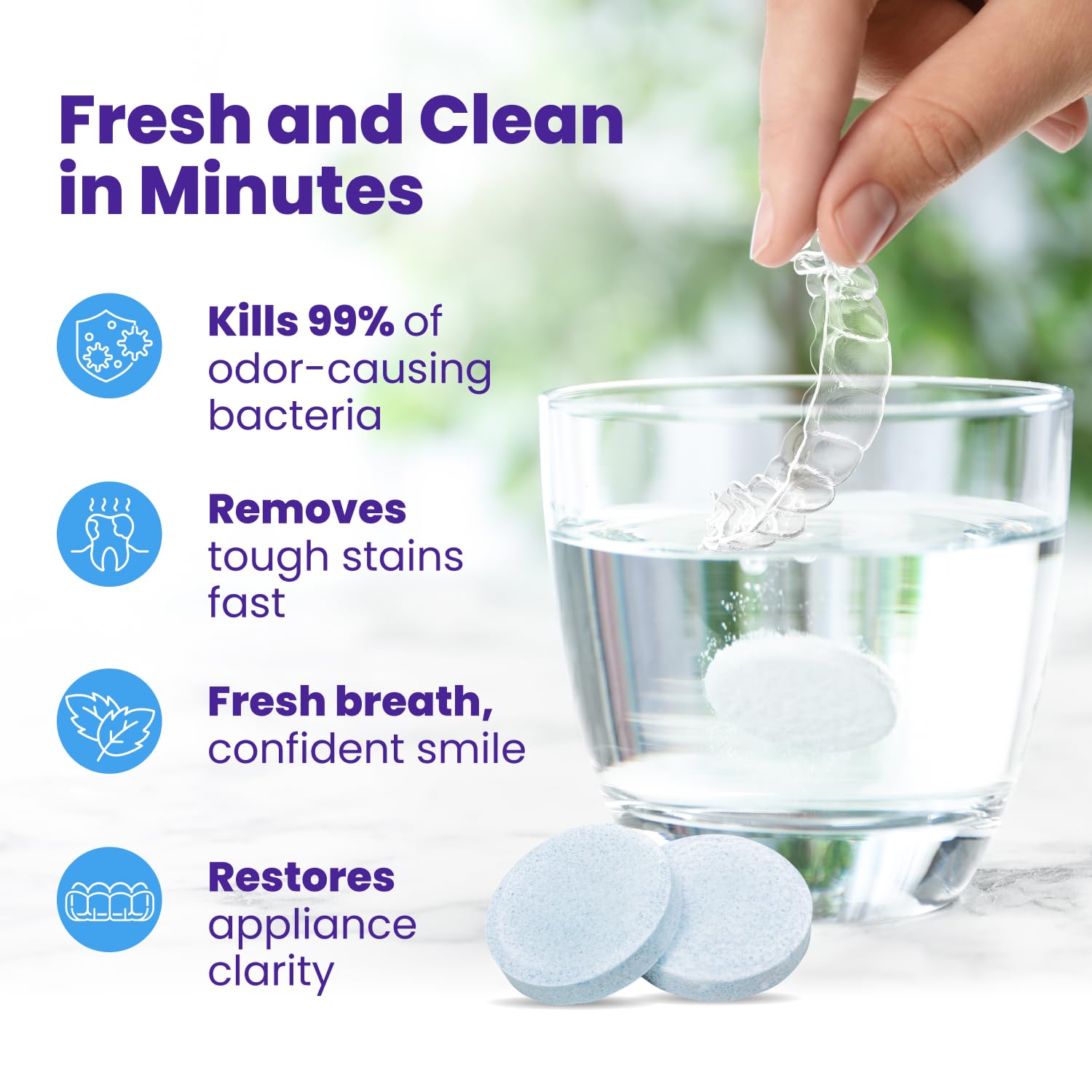Close up of clear retainers with cleaning tablets