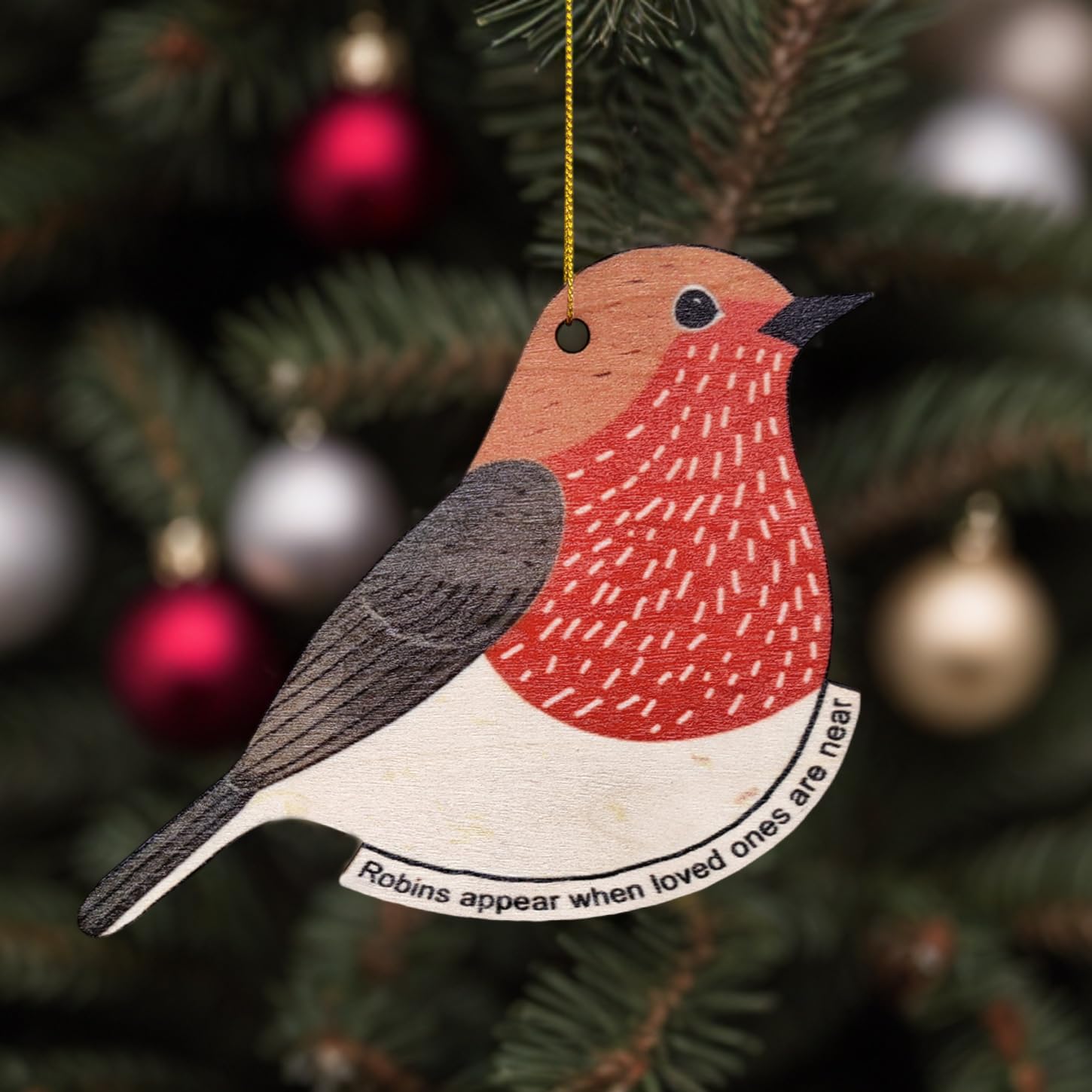 Robin ornament hanging with golden string