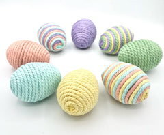 Lightweight plastic Easter eggs wrapped in macramé rope