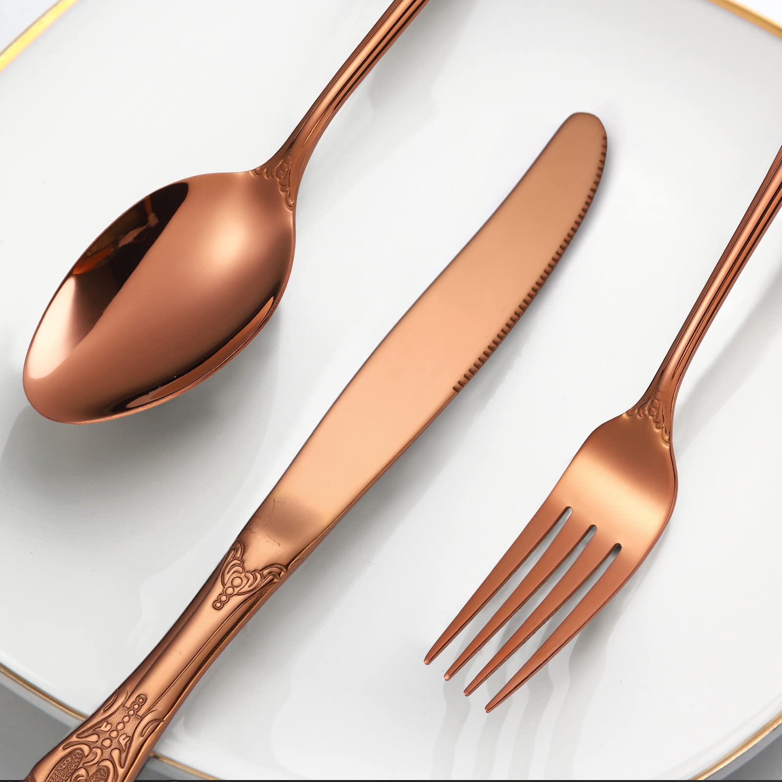 Copper finished silverware for entertaining four