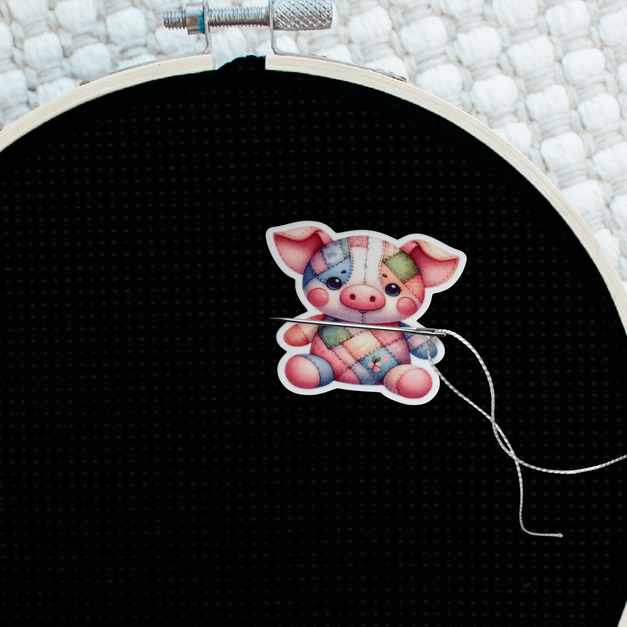 Cross stitch and embroidery compatible needle minder in pig theme