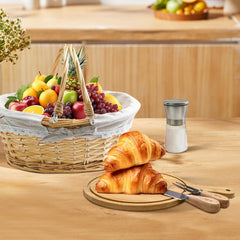 Round bamboo serving board inside gift basket