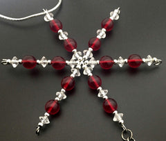 Dangling pewter 5K charm on snowflake ornament