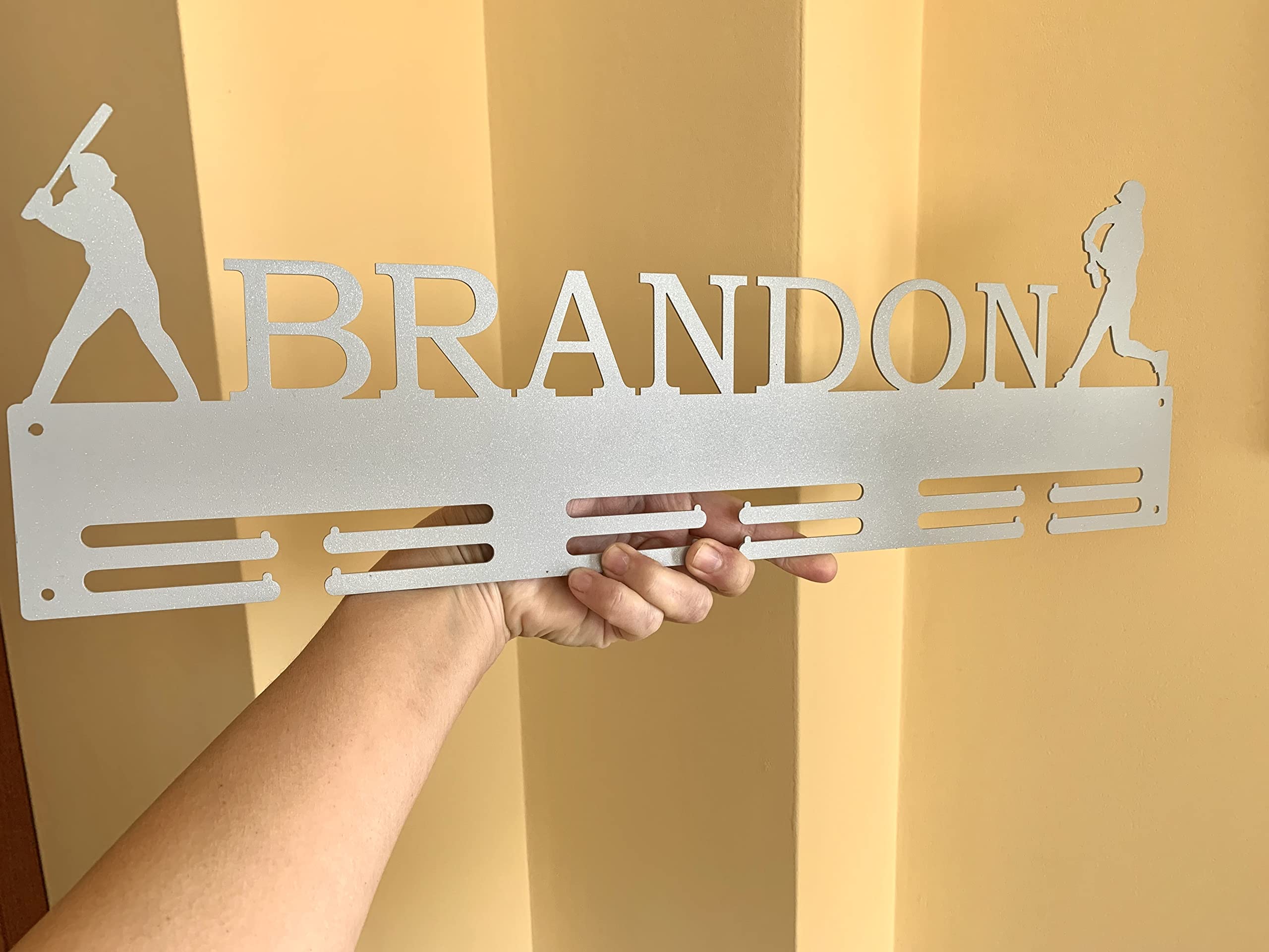 medal hanger with four sport options running gymnastics hockey baseball