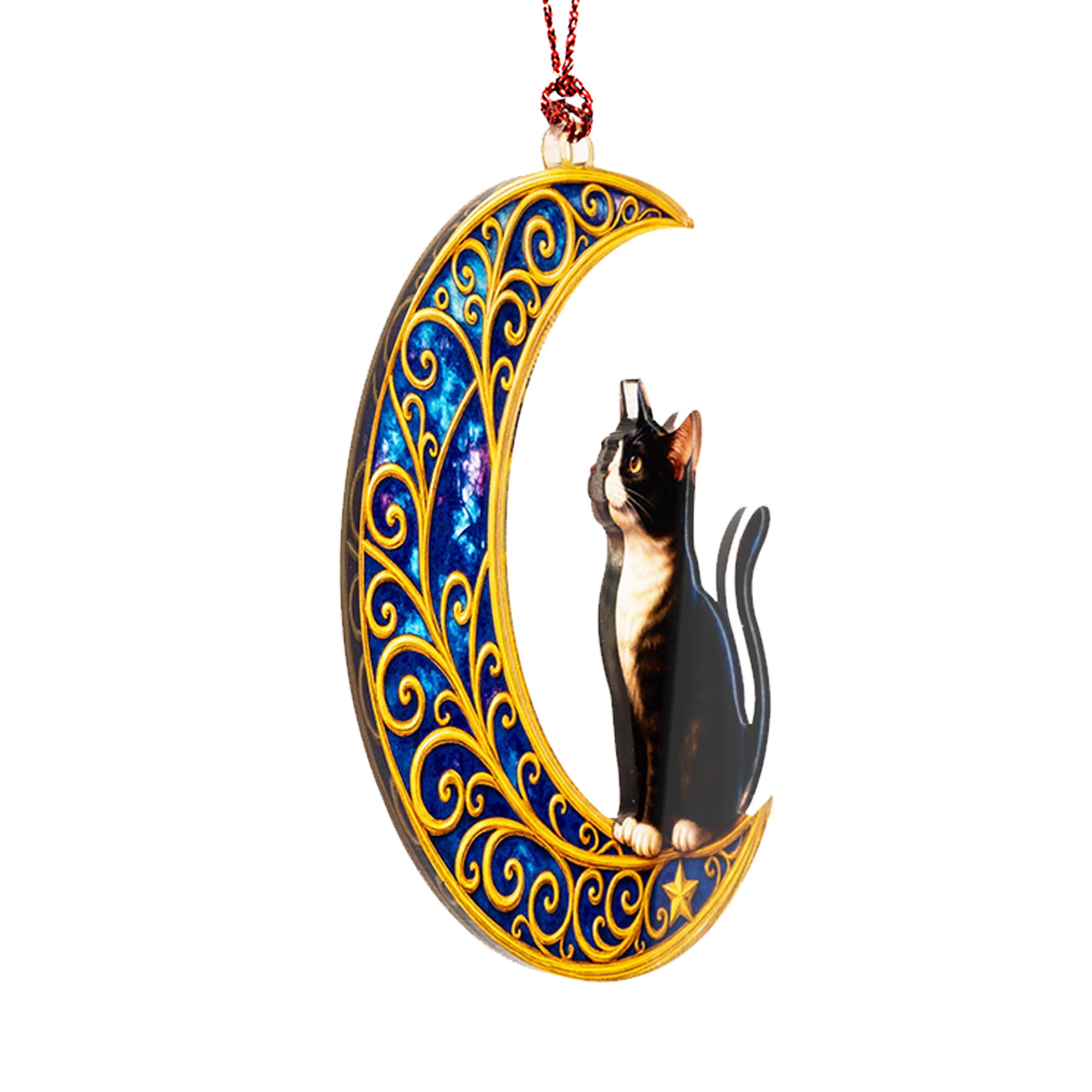 Christmas tree ornament with ornate gold scrollwork and deep blue backdrop