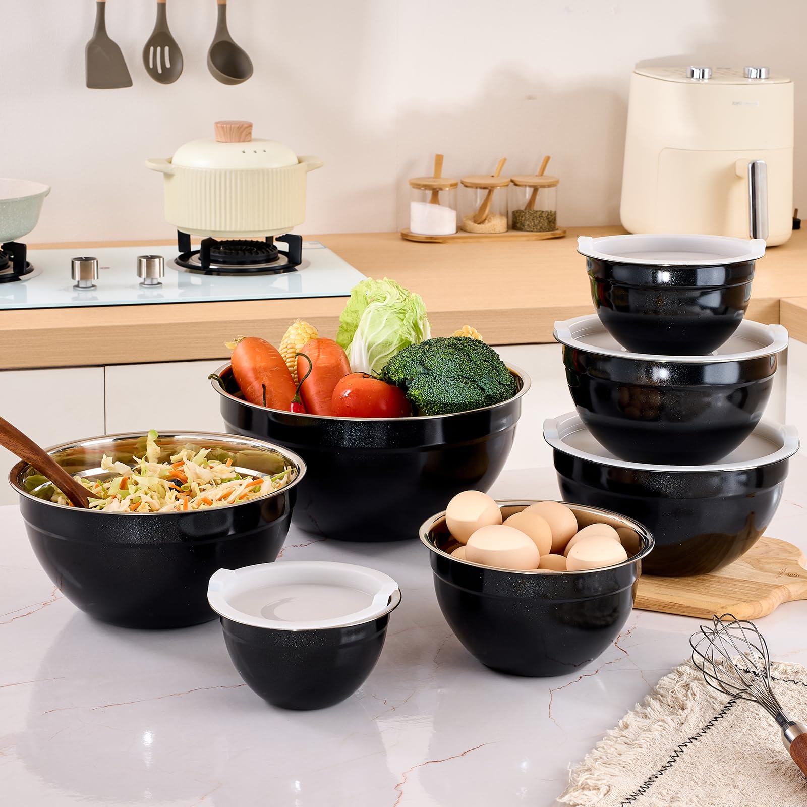 Seven size mixing bowls for baking prep and serving by Moxinox