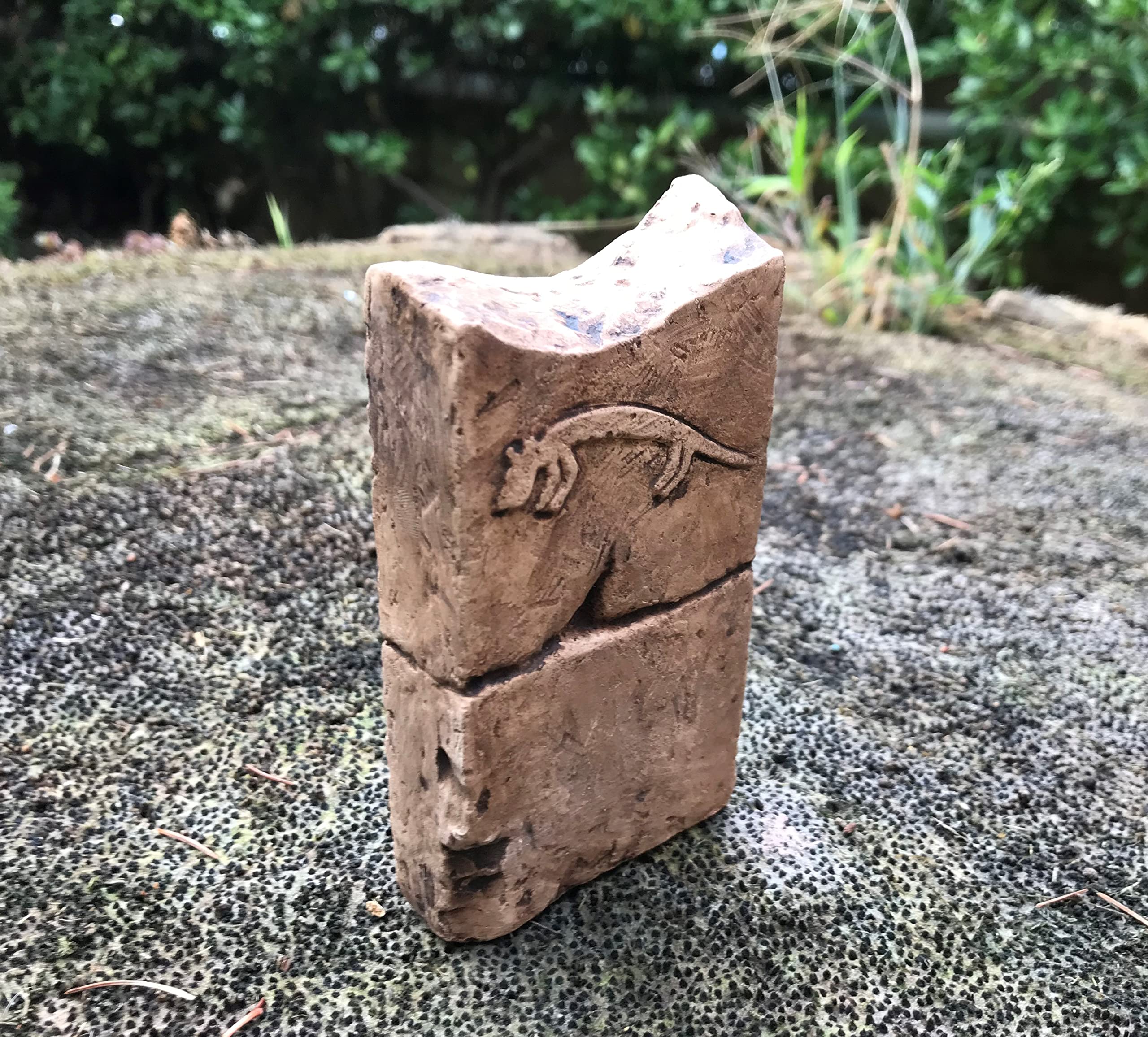 Three piece Gobeklitepe statue set on shelf display