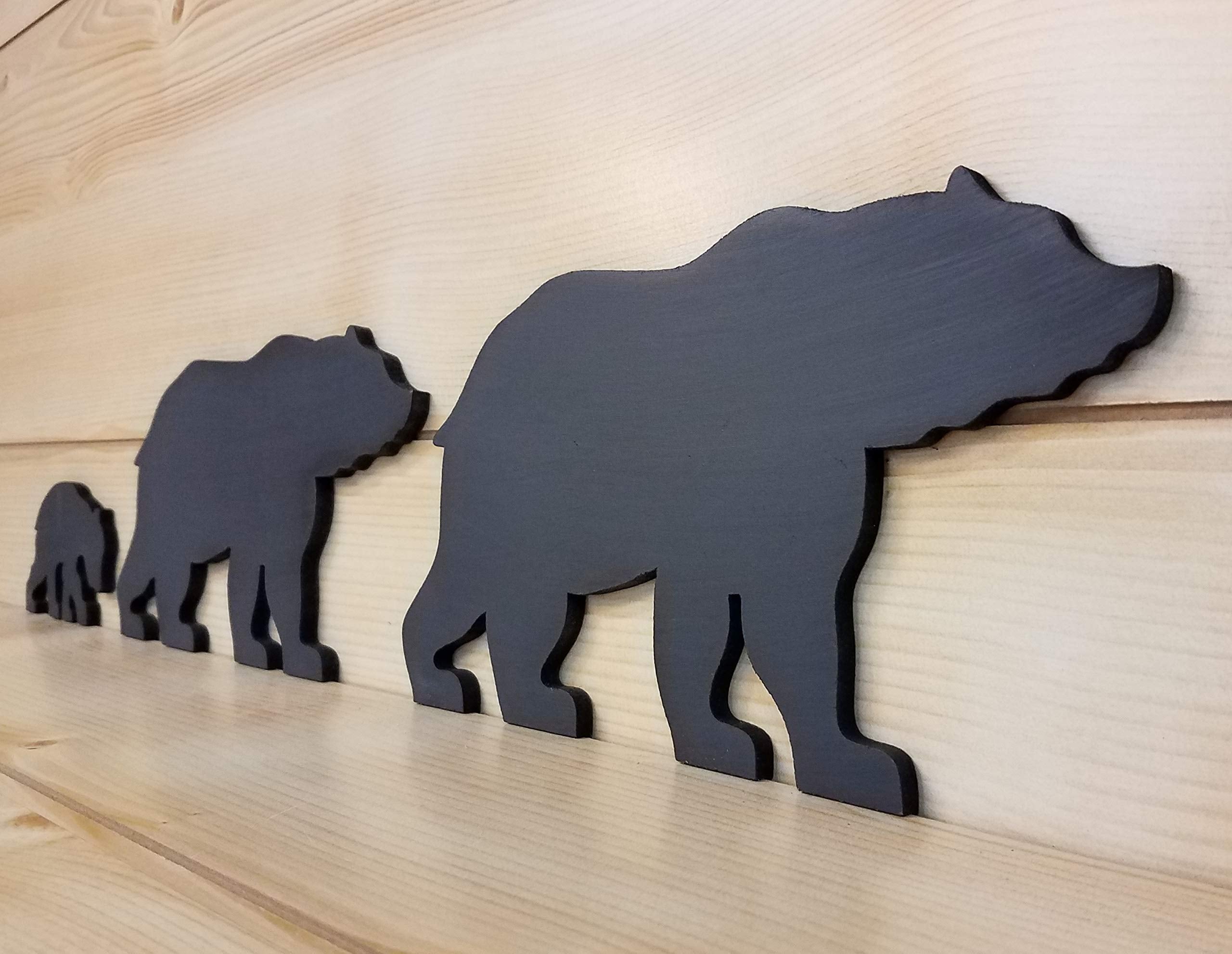 Rustic cabin wall decor with wooden bear silhouettes