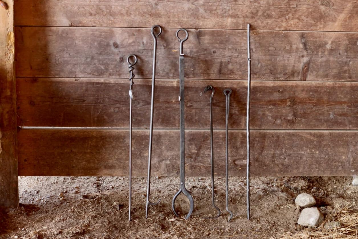 rustic wrought iron fire poker for campfires
