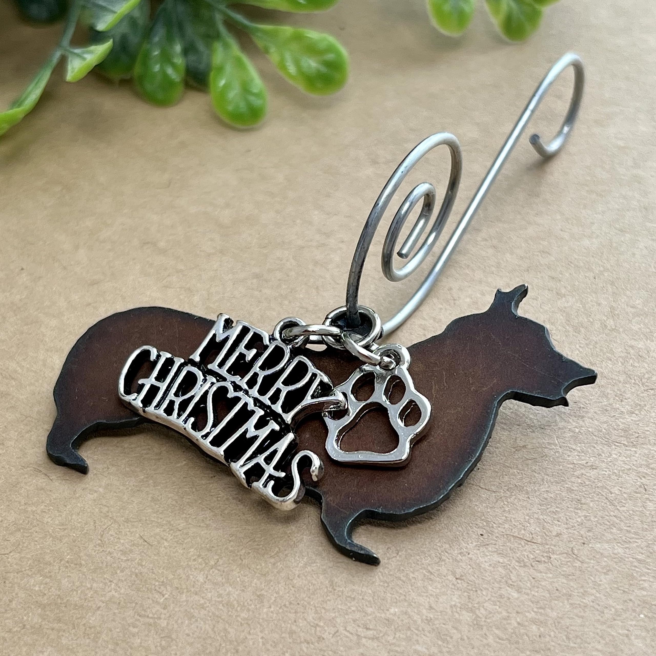 Rustic metal dog ornament with paw print charms
