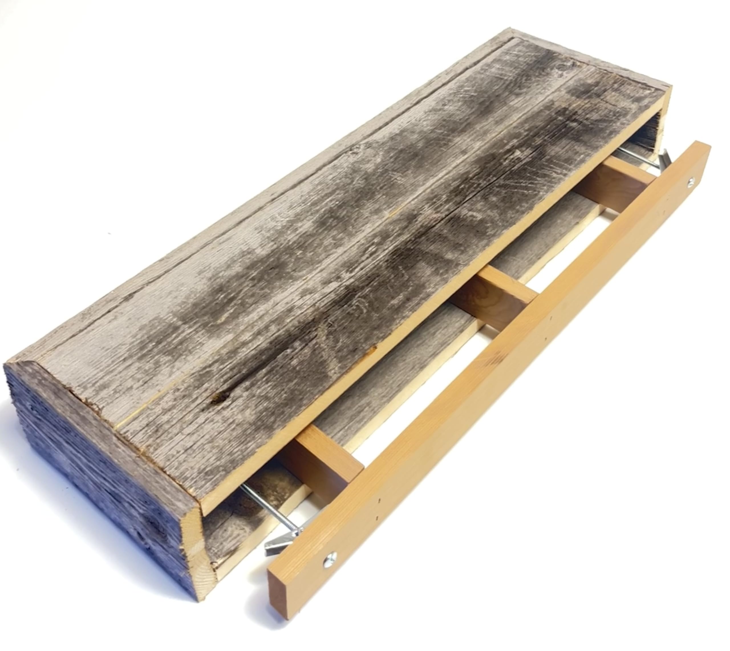 Living room display on rustic revival barnwood shelf