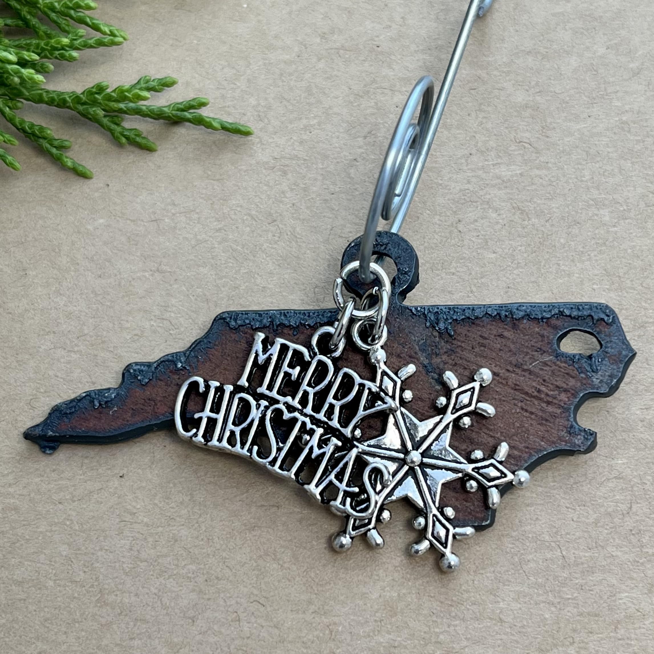 Rustic steel ornament from North Carolina with rusty finish