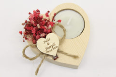 Rustic tealight candle holder featuring heart decor