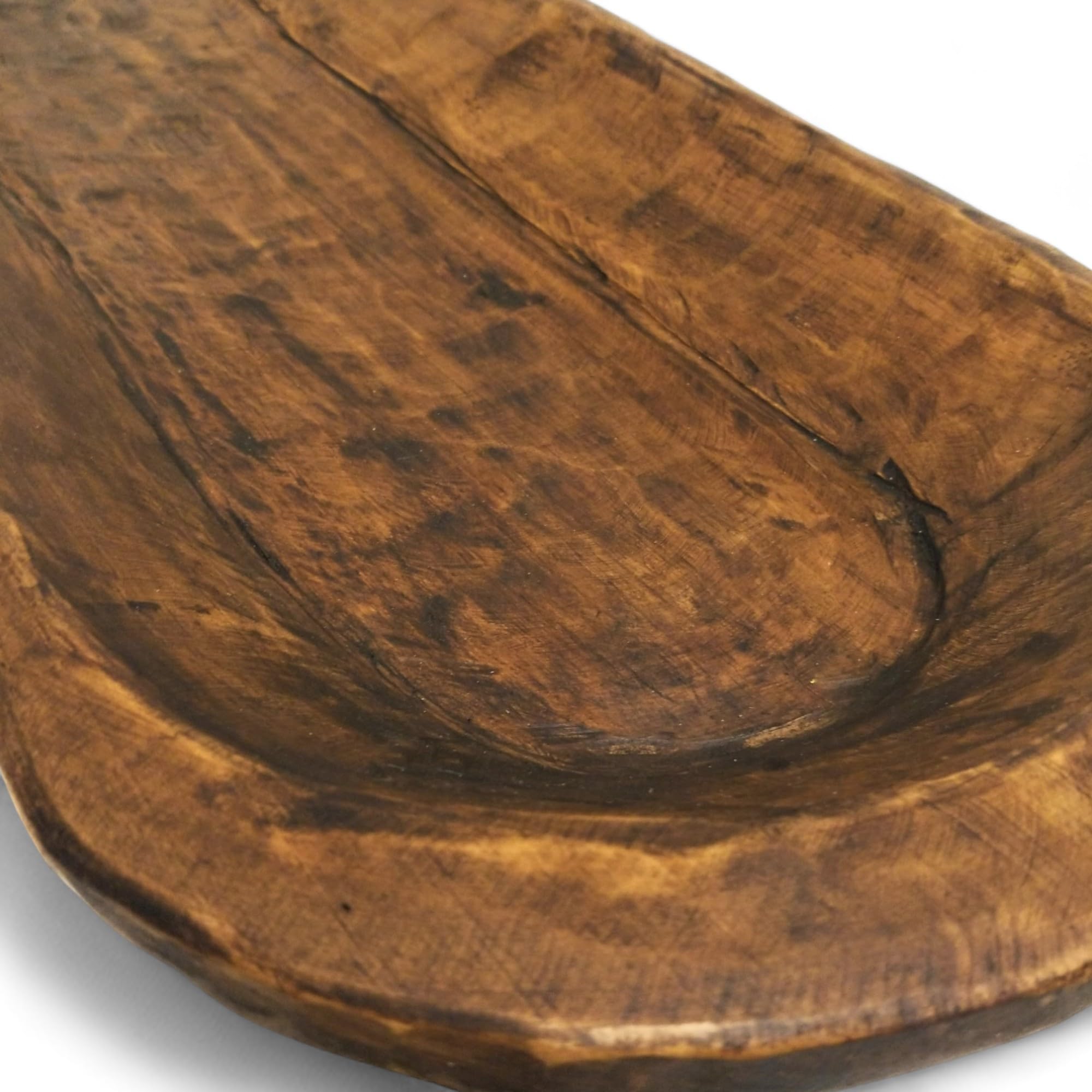 Rustic wood dough bowl on display
