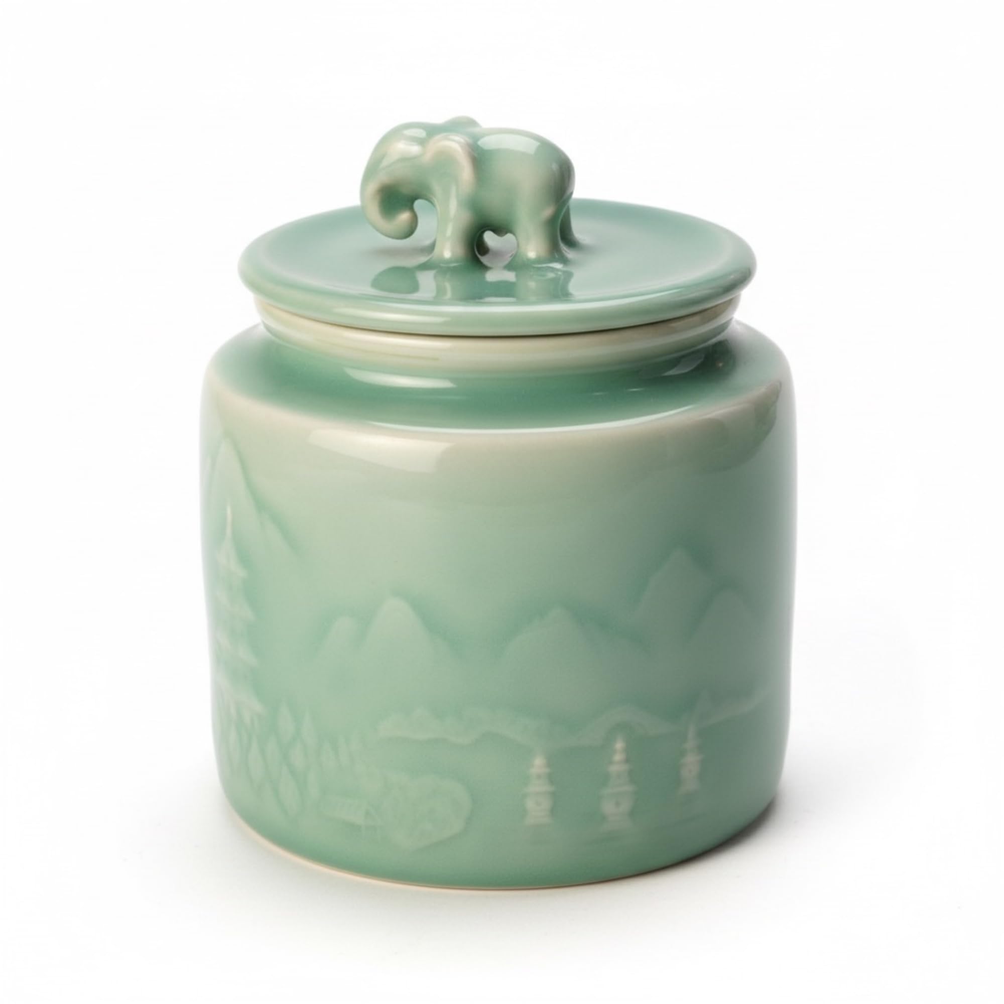 Sage green ceramic storage jar with elephant lid