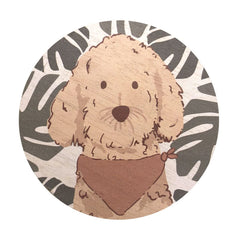 Decorative lid artwork on Sand + Paws scented candle