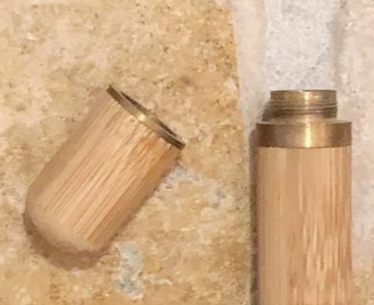 Pocket sized sandalwood cremation urn for travel
