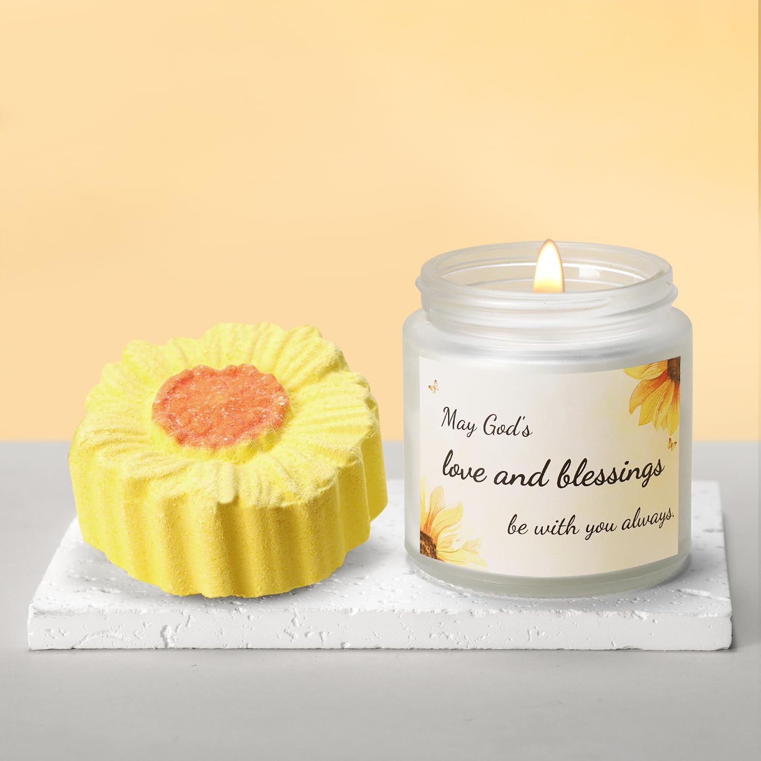 Scented candle and sunflower bath bomb components