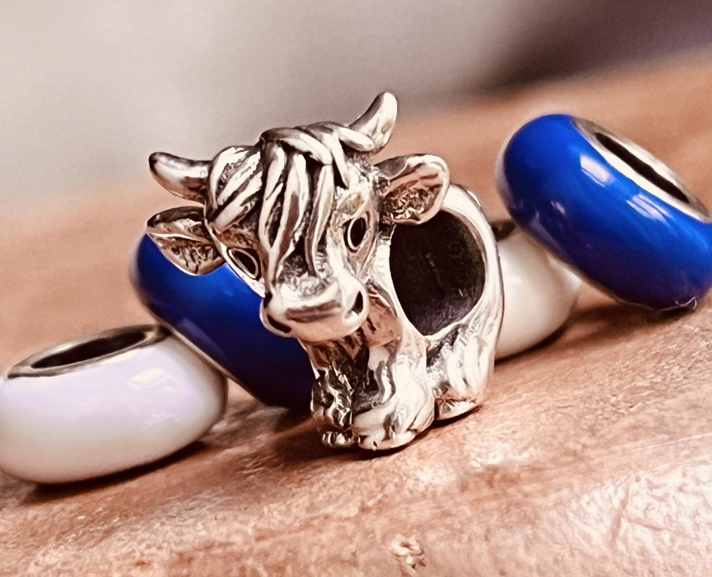 Sterling silver cow charm bead in gift pouch
