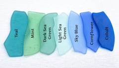 Machine tumbled sea glass place cards blank for customization with frosted surfaces in blue green hues