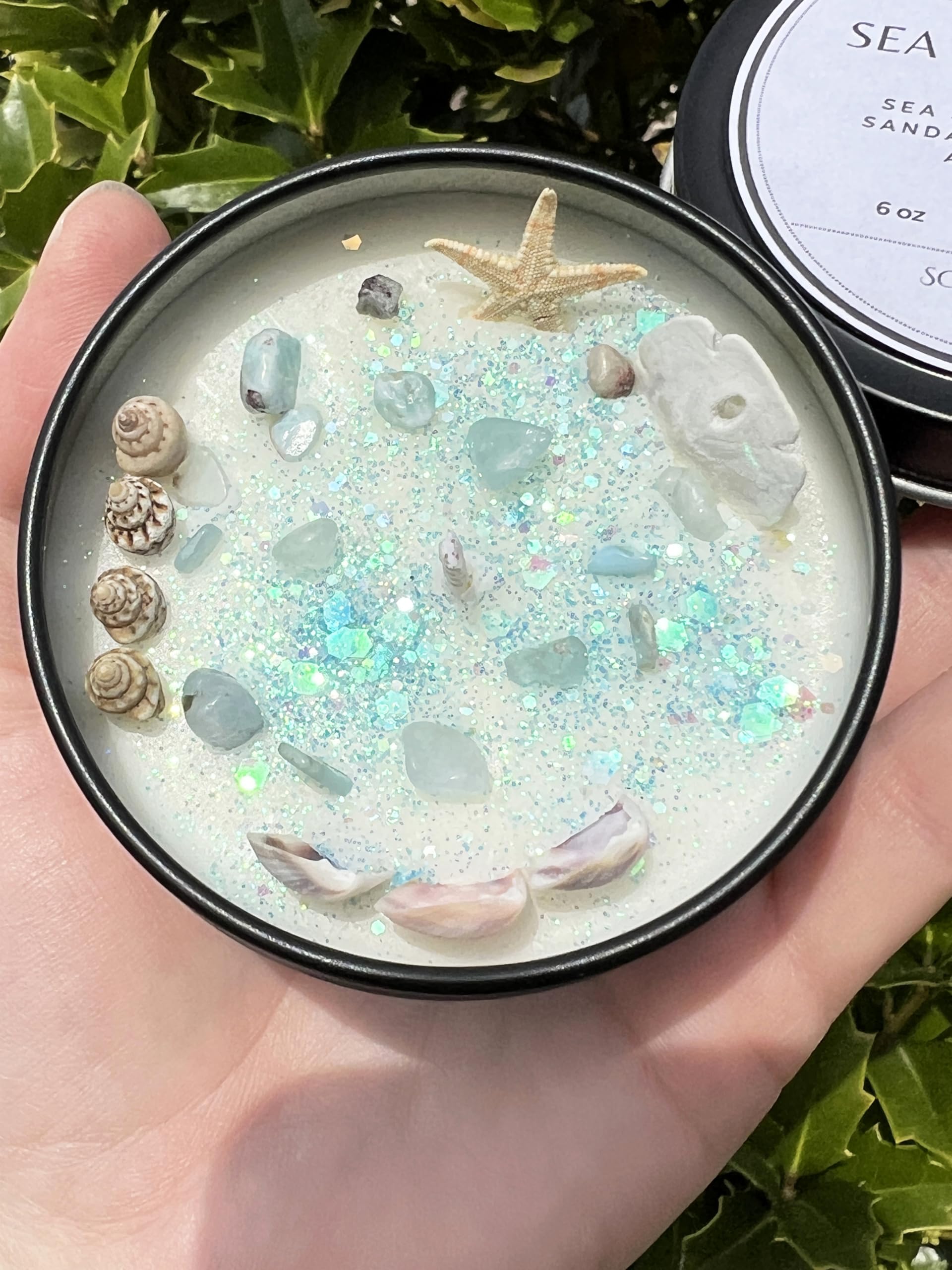 Candle topped with ocean shells and glitter by Sea Witch Mermaid Magick Candle