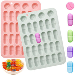 Blue and Pink 2-pack capsule-shaped silicone pill molds with 28 capsule cavities