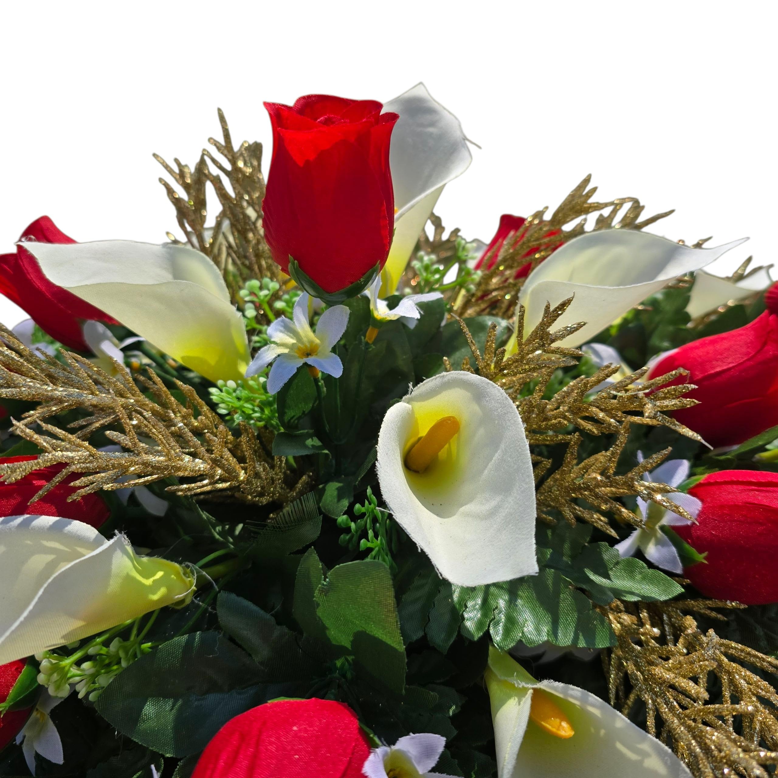 Cream calla lilies on winter grave decor