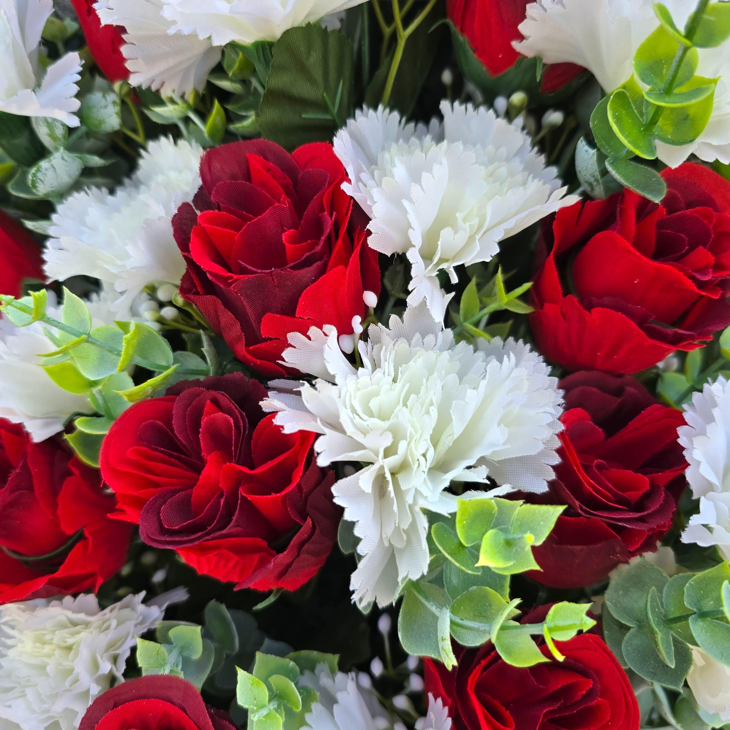 Foam filled plastic vase securing the arrangement