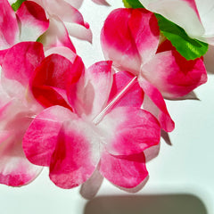 Colorful silk flower leis for beach party decor