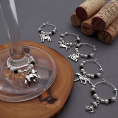 Pug charm included among the six silver wine glass charms with crystals and hoops