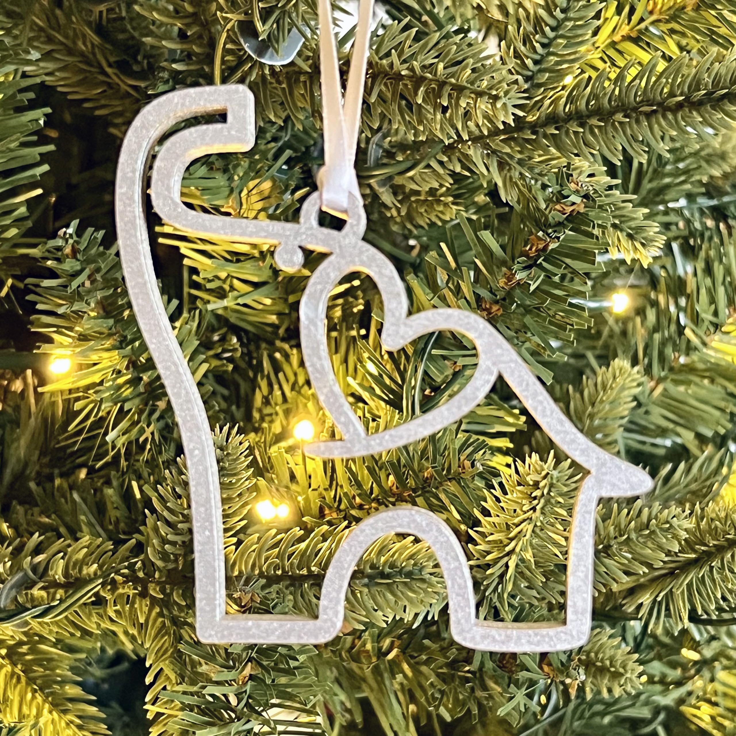 Story card paired with elephant ornament gift image