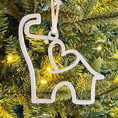 Story card paired with elephant ornament gift image