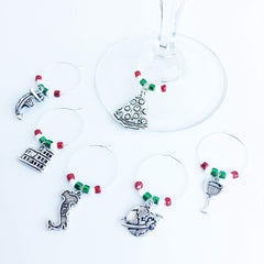 Airplane charm on wine glass marker with red white and green beads