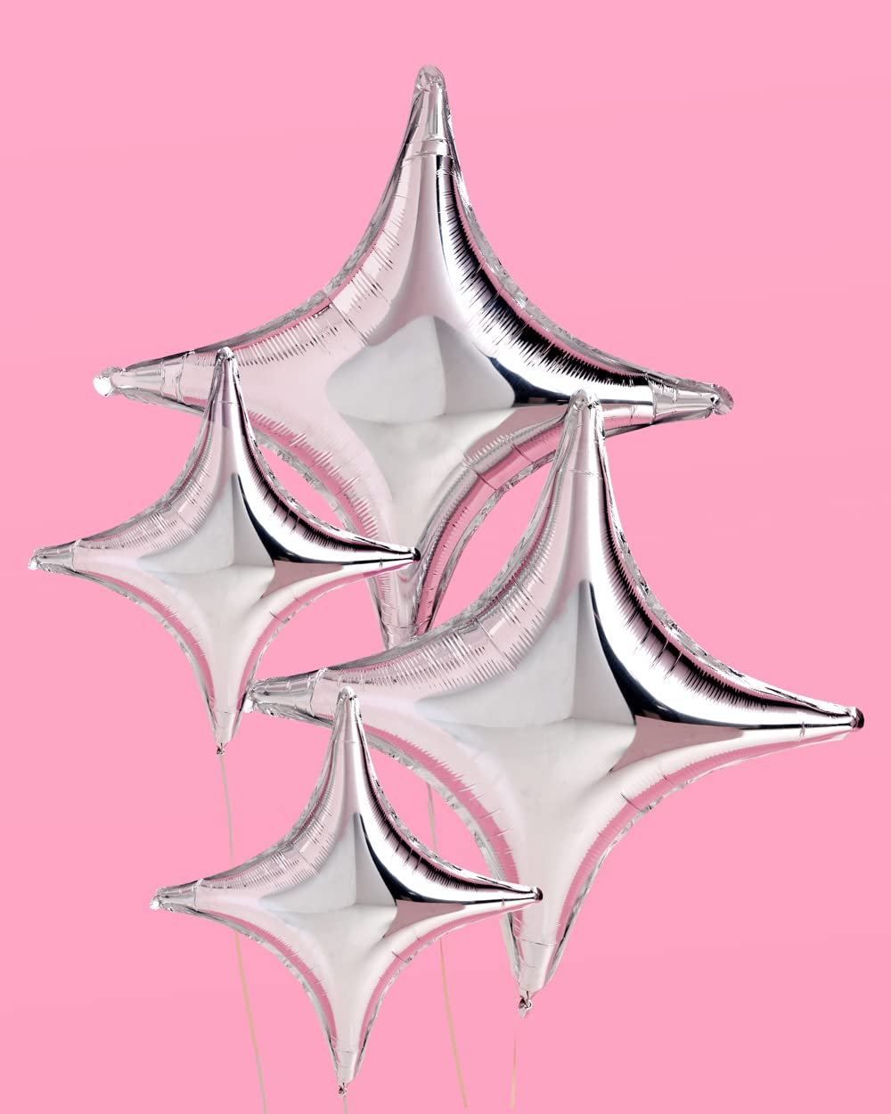 birthday party decor with silver sparkle balloons