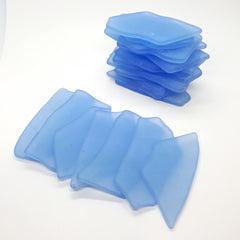 Irregular shaped sea glass place cards with flat surfaces