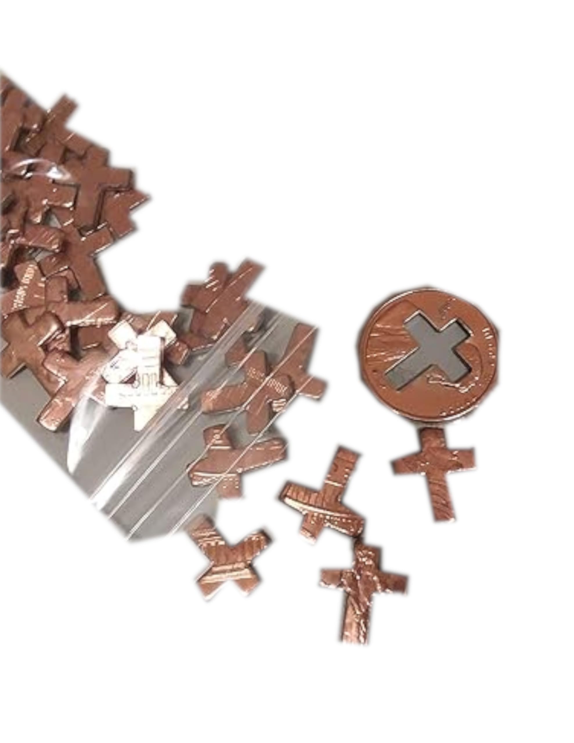 Small copper cross punch outs from pennies for jewelry and crafts