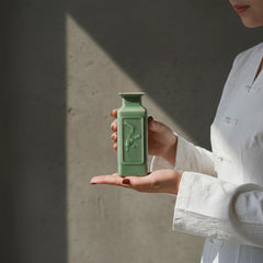 Small 5.5 inch tall flower vase suitable for single stem on a shelf