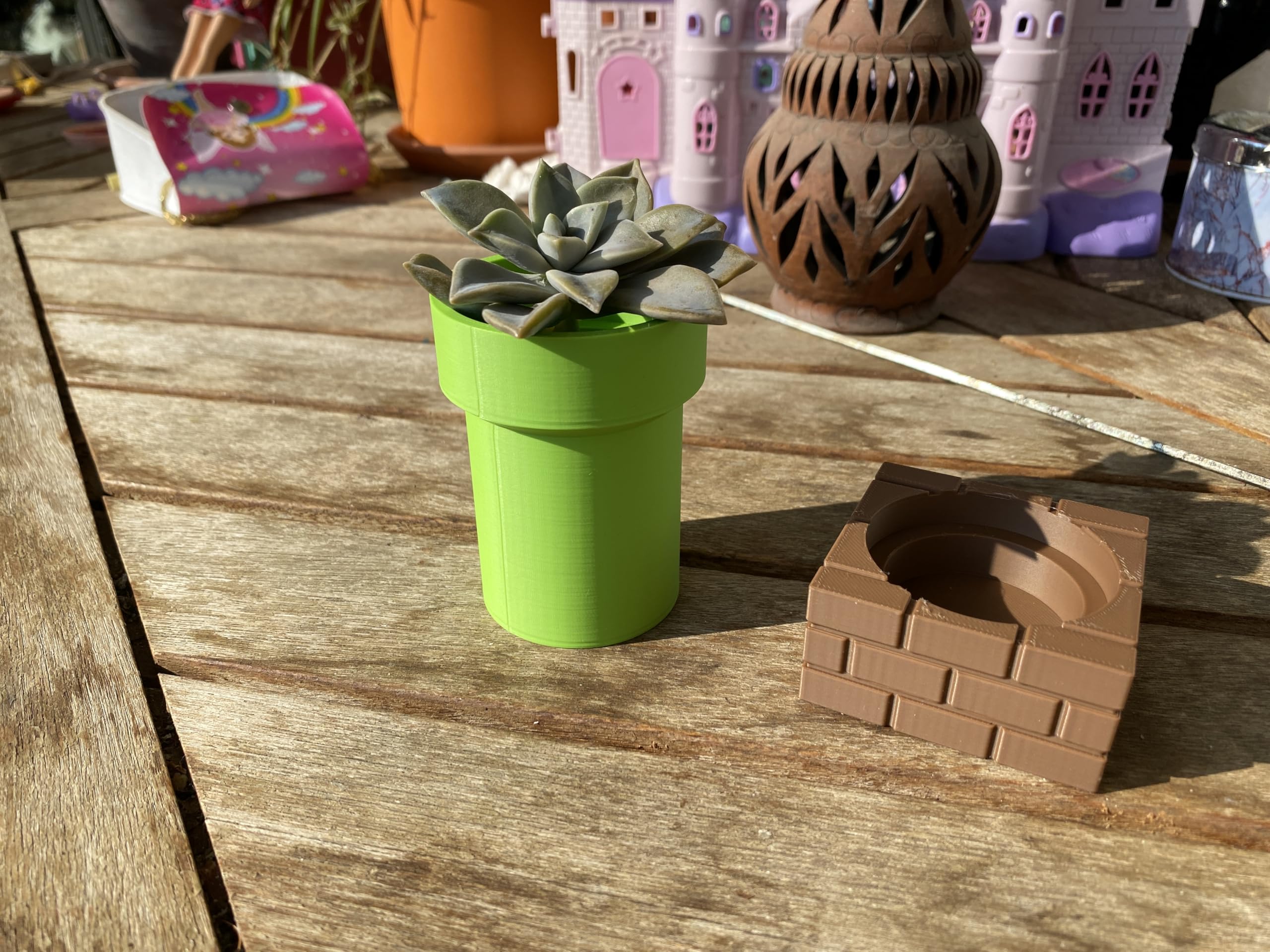 Small plants fit inside retro gaming planter